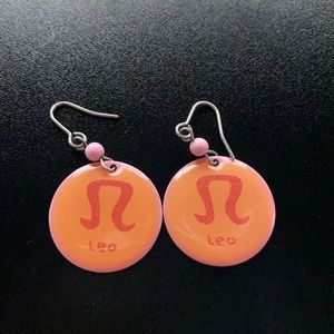 Leo astrological symbol earrings.